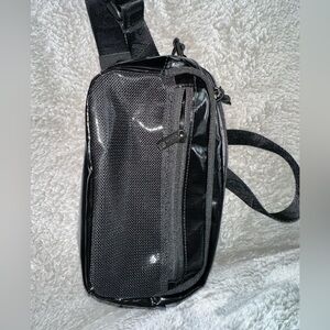 GUC Calpak small terra sling bag in obsidian black